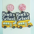 Detail of glitter pink studs and yellow school bus earrings with Back to School text - Yellow School Bus Back To School