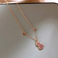 Macro detail of rose gold gourd pendant necklace with pink and white zircon stones - Gold Pave Zirconia Pink White Gourd / Gold