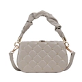 Taupe quilted handbag with gold flower accents and ruffled handle on white background - Gray
