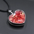 Heart-shaped glass pendant necklace with red crystal chips and black cord strap - Red Coral Stone