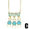 Collana dorata minimalista con cuori in zircone blu e ciondoli a forma di persona - Modello Cuore Blu e Turchese Ragazzo