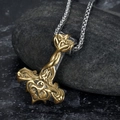 Nordic Mjölnir pendant in gold and silver finish with detailed Celtic relief on black stone - Celtic Knot Two-Tone Style (A0217-2)