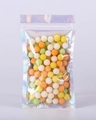 Holographic laser ziplock bag for jewelry packaging filled with colorful round candies - 6x10cm