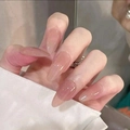 Glossy long almond-shaped press-on nails in elegant sheer nude for a natural look - Oval / Natural Clear Nude