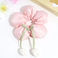 Macro shot of pink floral scrunchie with satin texture and white tulip charms - Pink Tulip