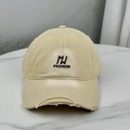 Detailed close-up of distressed brim and black embroidery on khaki cotton baseball cap - One Size (58-60cm) / Beige