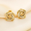 Detail of gold knot earrings with white enamel and sparkling pave cubic zirconia - Knot Garland Style (KE115091-K)