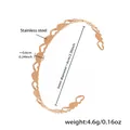Elegante bracciale rigido aperto a forma di cuore in oro rosa in acciaio inossidabile - Design Traforato a Cuori Uniti (Z177) / Oro rosa