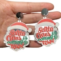 Detail shot of acrylic Santa Claus earrings with Santa Claus is coming to TOWN text - Silver Santa Claus