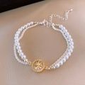 Pulsera de doble capa con perlas y cadena de plata, colgante de estrella dorada y circonitas - Estilo de Estrella de Doble Capa / Oro-Blanco