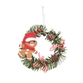 Christmas wreath featuring pine cones red berries and a festive gingerbread man doll - Gingerbread Man