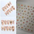 3D Christmas nail stickers with colorful rhinestones and gold snowflake patterns on Co-495 - Gold Starburst Colorful Rhinestone Style (CO-495)