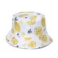 Reversible bucket hat featuring realistic lemon print in bright yellow and white - Bright Yellow Background Lemon Slice Style