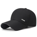 Black cotton baseball cap with breathable mesh texture and metal side plaque detail - Adjustable / Black
