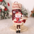 Dettaglio calza di Natale con pupazzo di neve 3D e stampa Merry Christmas decorativa - Stile Pupazzo di neve in ecopelle