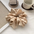 Close-up of champagne gold satin hair scrunchie showing silky texture and smooth gloss - 3#Champagne