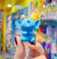 Cute blue resin elephant keychain with golden crown and pearl detail on hand - Single Doll / Blue