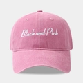 Detailed texture of washed pink cotton canvas on baseball cap with white embroidery - Adjustable / Pink