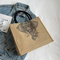 Linen tote bag with black elephant print and braided handles for stylish women - Elephant Style