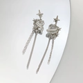 Macro detail of silver long tassel earrings with heart and star charms on mirror surface - Star Heart Tassel Combination Style (DZ-846)