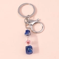 Llavero de botella de deseos con flor seca rosa y purpurina azul en vial de cristal - Flor Seca Azul (YZ130lanse)