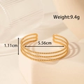 Adjustable golden stainless steel cuff bracelet featuring a triple-layer bead design style - Triple Layer Beaded Style (YB-194)