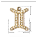 Detailed view of Gemini zodiac pendant in gold-plated stainless steel with zircon stones - Gemini / Gold