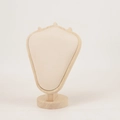 Close-up of wooden necklace display stand with beige velvet padding and round base - Natural Wood Beige