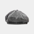 Detailed close-up of a vintage washed denim newsboy cap with grey texture and top button - One Size / Black (Smoky Grey)