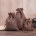 Three sizes of brown burlap drawstring gift bags for jewelry packaging on wood surface - 7*9cm / Coffee