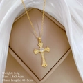 Detail view of gold cross pendant with cubic zirconia, size 1.8x3.4cm on 40+5cm chain - Cross Rhinestone Pendant Style (D449)