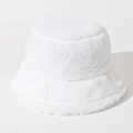 Close-up of white plush bucket hat with soft faux fur texture for winter warmth - One Size / White