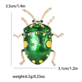 Gedetailleerde afmetingen van groene emaille keverbroche met maat 3,5x3,1cm en gewicht 6,5g - Groen 4506-GN / Groen