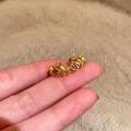 Close-up of gold-plated Pixiu earring with ancient coin detail on soft plush fabric - Pixiu Coin Style (5# Ring-Gold)