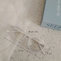 Detail showing dimensions of transparent grey kids' glasses weighing only 20g - Clear White
