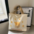 Beige canvas tote bag with cartoon giraffe print and stylish khaki shoulder straps - Beige Cartoon Giraffe Pattern