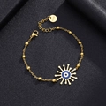 Detail view of gold stainless steel bracelet with blue evil eye sun pendant and lobster clasp - Style 8 (Bohemian Blue)