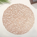 Close-up of rose gold hollow mesh placemat with a minimalist round woven design - 38cm Round / Rose Gold