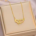 Elegant gold double heart necklace with crystal paving on champagne jewelry box - 6066 Double Heart Pendant / Gold