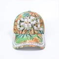 Detailed view of floral baseball cap with GIRL rhinestone letters and pearl brim trim - Adjustable / Green GIRL