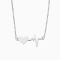 Polished stainless steel heartbeat necklace with EKG waveform heart pendant on white background - Steel