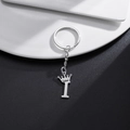 Silver letter I keychain with a crown charm on a minimalist background - Letter I Crown Style (I)