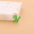 Letter 'n' pendant in green enamel and gold finish with small connector ring - Enamel Letter-N