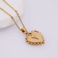 Golden heart pendant necklace featuring embossed letter Y and beaded edge on O-chain - Y (With Chain)