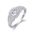 Silver moissanite ring with a halo setting and geometric side accents on a white background - US 7 / Geometric Halo Round Style (R13327)