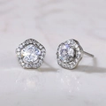 Elegant flower-shaped silver stud earrings with sparkling cubic zirconia flower petals - Flower