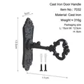 Vintage black cast iron key-shaped door handle with ornate patterns and mounting hardware - Cast Iron Key Door Handle 7032