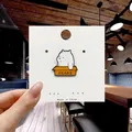 Cartoon enamel pin featuring Ice Bear in a box on a display card for bag decor - 149*White Bear in Bears Box Pin