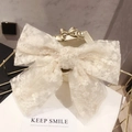 Elegant cream white lace bow hair clip featuring delicate floral embroidery patterns - Lace Embroidery Style / Beige Lace Bow Clip