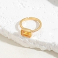 Adjustable gold ring featuring a rectangular yellow gemstone and clear zircon accents - Yellow Gemstone Style (JZ0296-5)